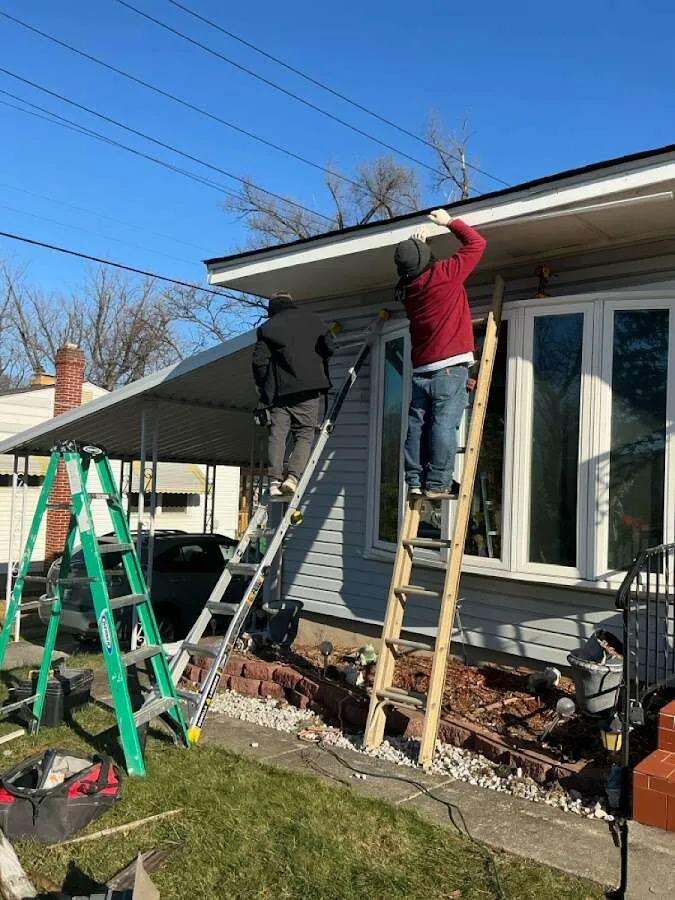 Restoration crew performing exterior repair in Franconia